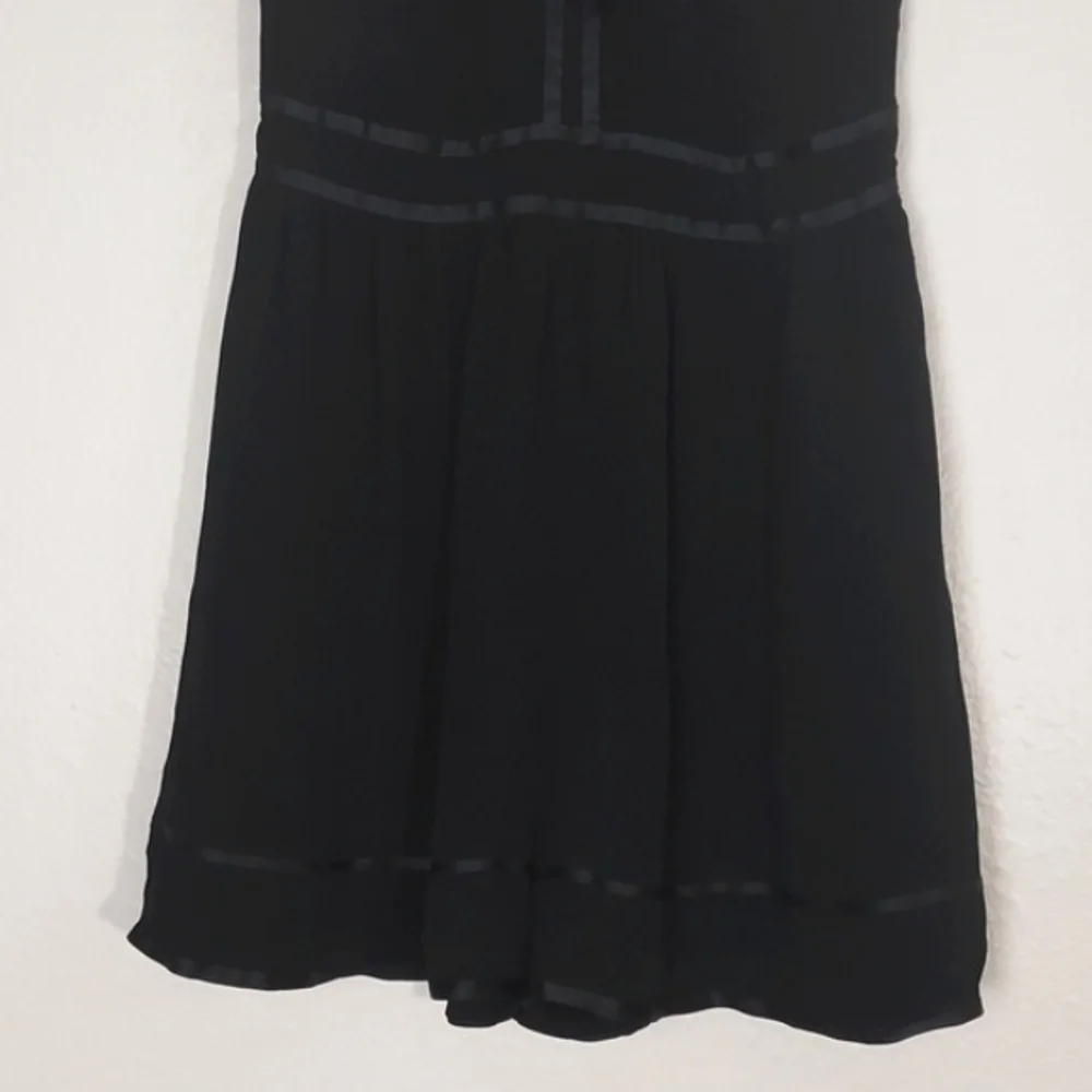 Anthropologie Romper Ruffled Black Size 6